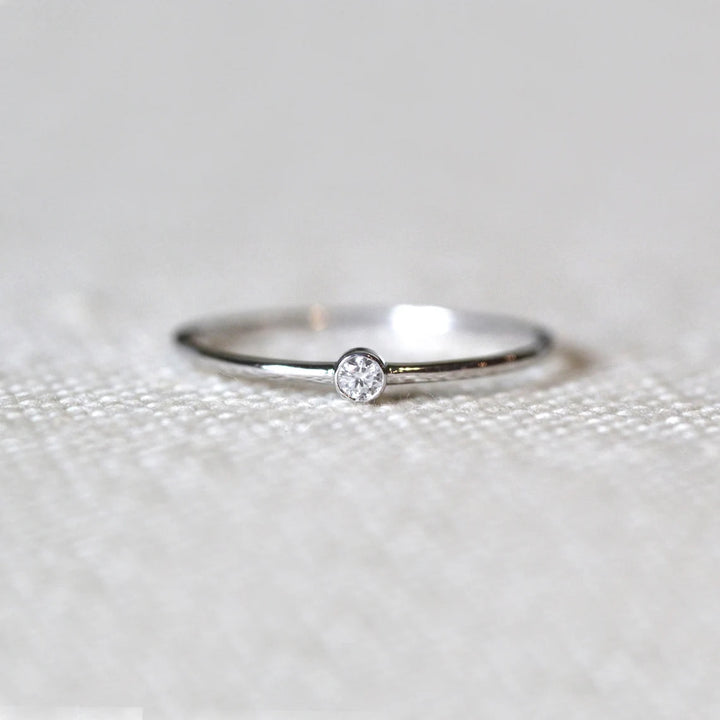 Tiny Diamond Engagement Ring